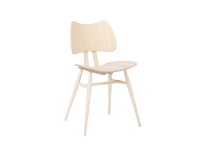 A clear matt colour wooden dining chair with a curved backrest, tapered legs, and a curved wooden seat and backrest against a white background.