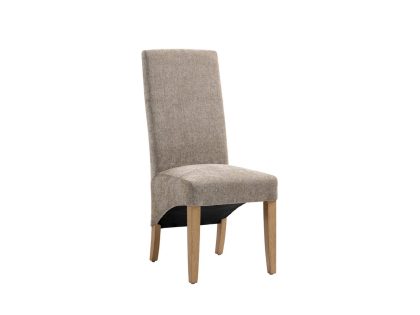 A traditional mink colour fabric dining chair with a tall backrest and wooden legs against a white background.