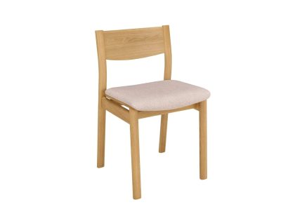 A natural oak dining chair with a single horizontal slat on the back and a light grey fabric seat.